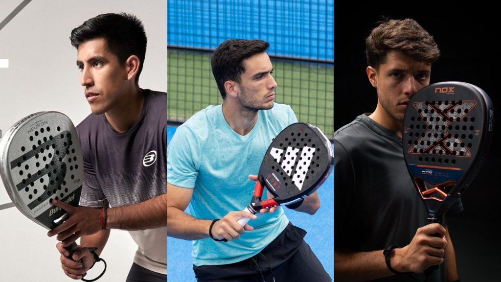 Palas de pádel de las marcas Bullpadel, Adidas y Nox colocadas en fila sobre una pista, listas para comparar su rendimiento.