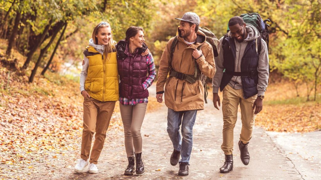 Backpacker preparing for an adventure trip in Andalusia with hiking gear and technical clothing
