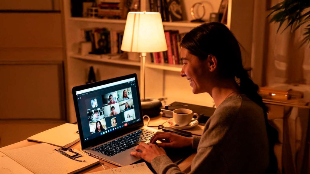 student taking an online English class in a cozy environment, modern setup, international community